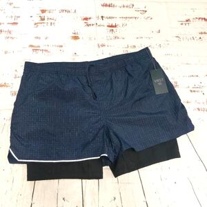 VRST Hybrid Running Shorts with built-in compression shorts.